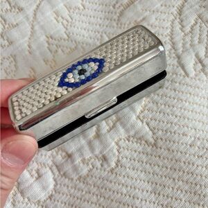 Silver Compact with Blue and White Beaded Design featuring the evil eye design.